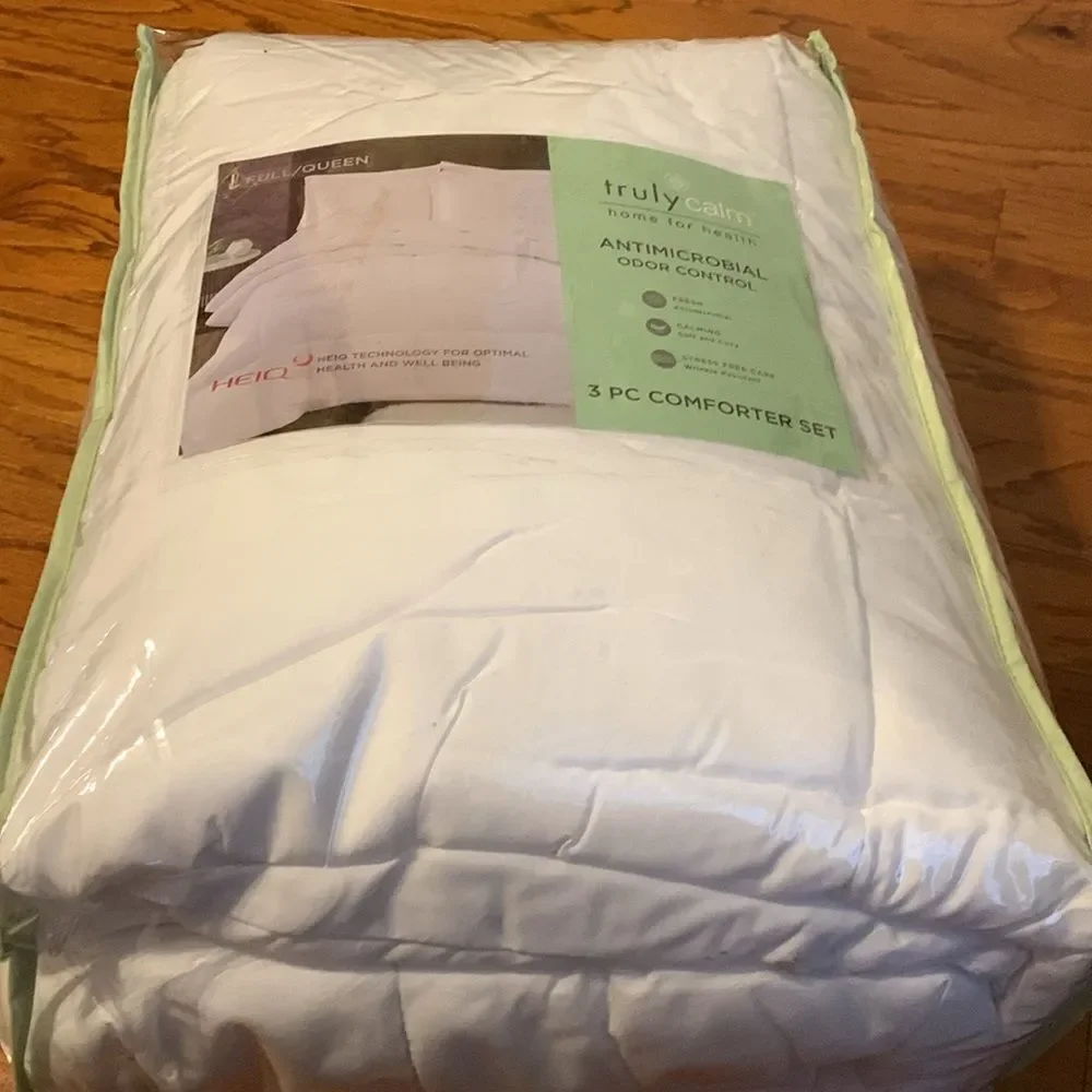 Three piece white antimicrobial odor control comforter set.  From Home Depot